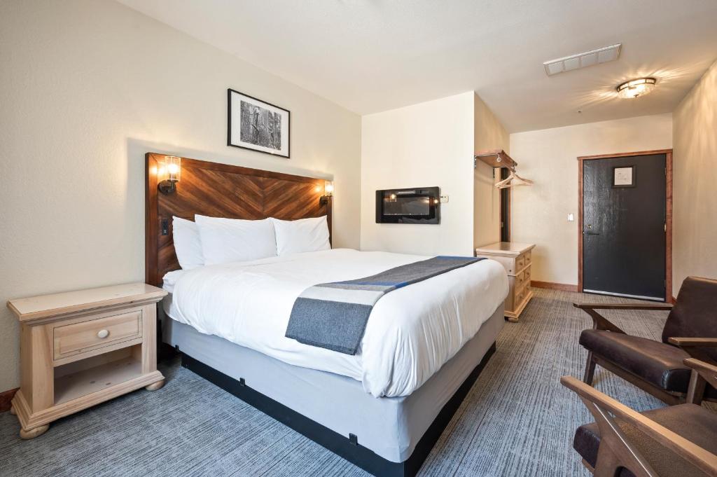 Postel nebo postele na pokoji v ubytování Hotel Leavenworth