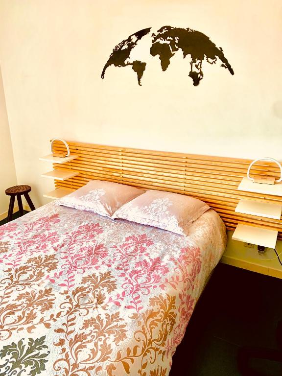 Postel nebo postele na pokoji v ubytování Le tout à pied!