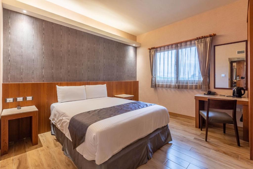 Postel nebo postele na pokoji v ubytování Hualien Toongmao Resort