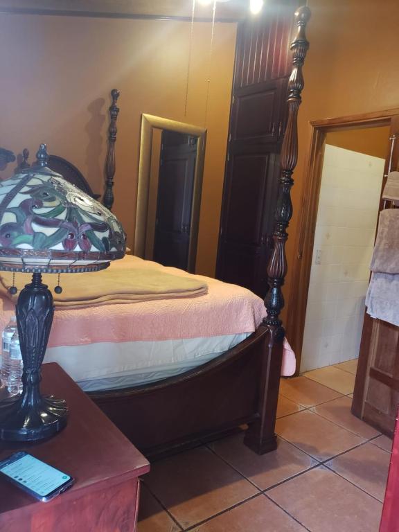 Postel nebo postele na pokoji v ubytování Bama House hn
