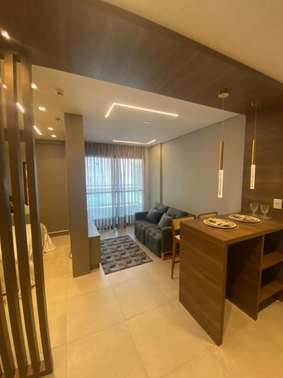 Χώρος καθιστικού στο Flat charmoso Jardim Botanico