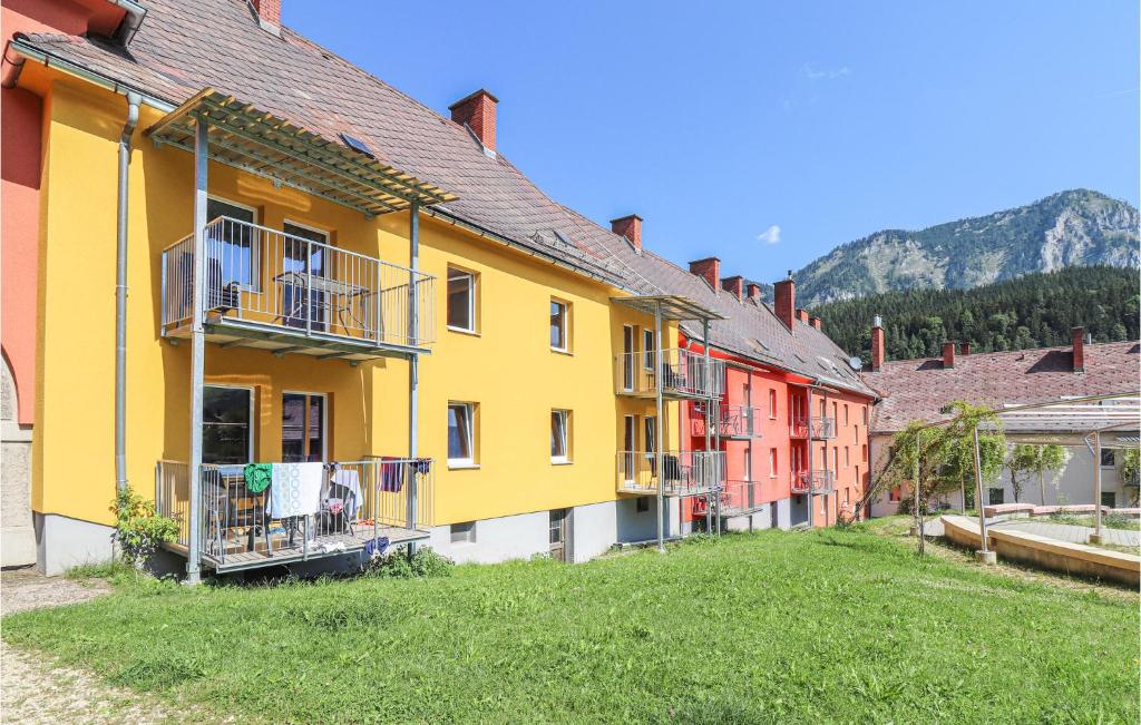 a row of colorful houses in a village at Stunning Apartment In Eisenerz With 2 Bedrooms And Wifi in Eisenerz