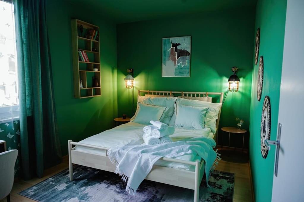 Postel nebo postele na pokoji v ubytování Boho-Chic-Wohnung Neusiedl