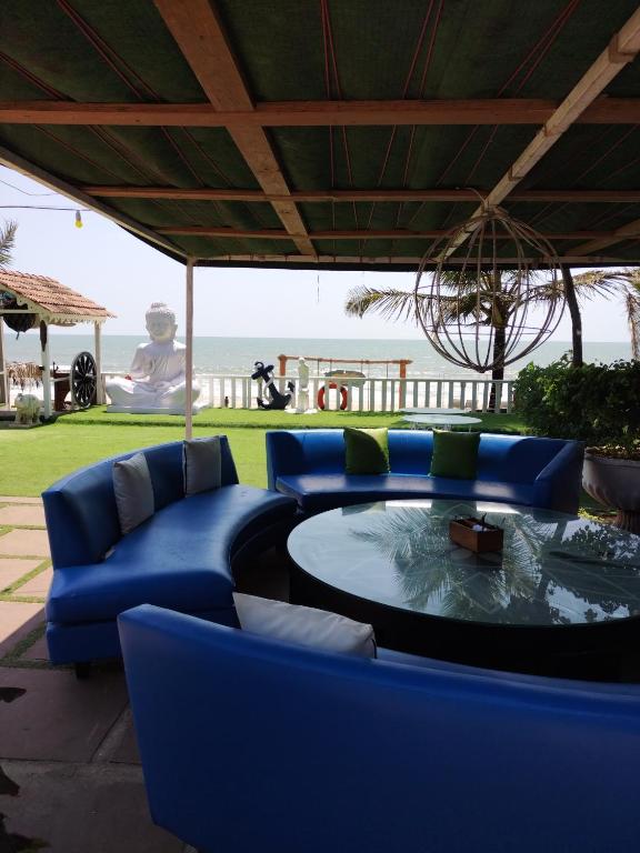 Posezení v ubytování Nasya Beachside Cottages