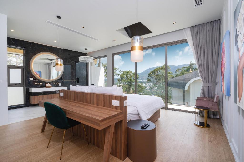 TV a/nebo společenská místnost v ubytování Himmapana Villas - Hills