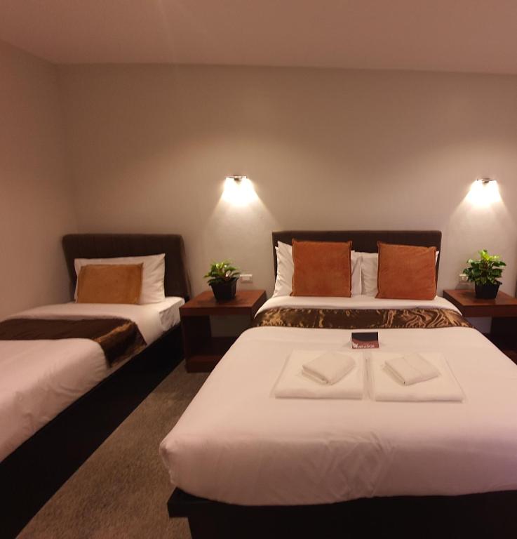 Postel nebo postele na pokoji v ubytování Hotel Mirador