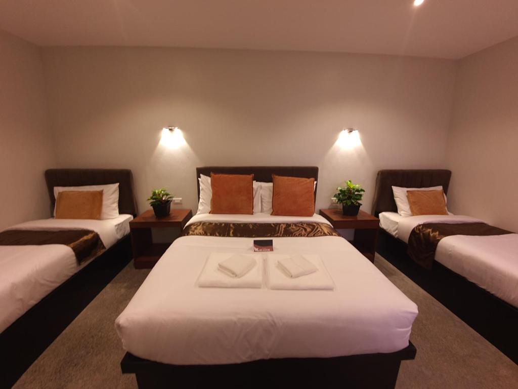 Postel nebo postele na pokoji v ubytování Hotel Mirador