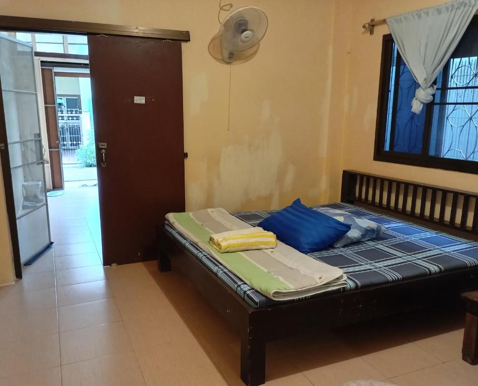 Postel nebo postele na pokoji v ubytování NP guesthouse
