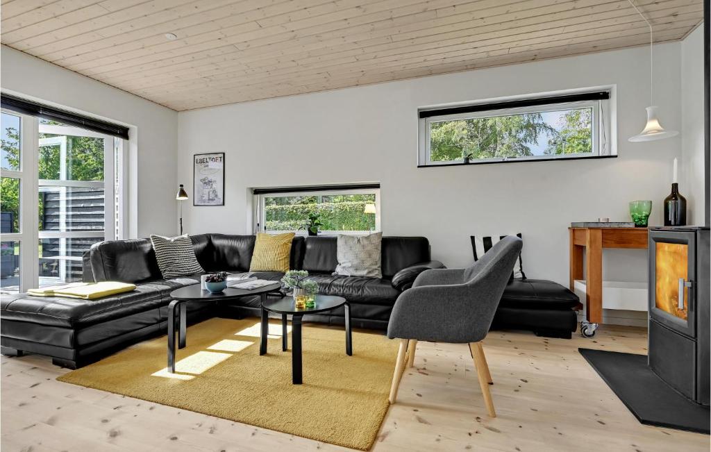 Posezení v ubytování Holiday Home Ebeltoft With Fireplace Xi