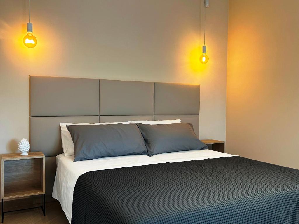Postel nebo postele na pokoji v ubytování B&B Radice