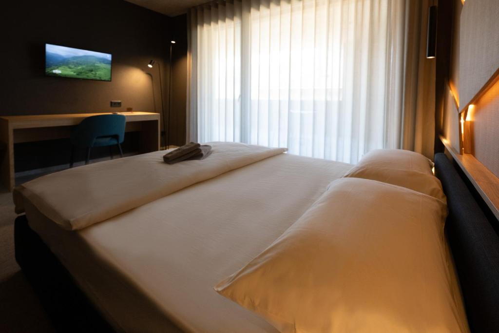 Postel nebo postele na pokoji v ubytování 6532 Smart Hotel - Self check-in