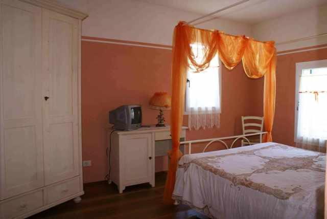 Posteľ alebo postele v izbe v ubytovaní Agriturismo Antiche Mura