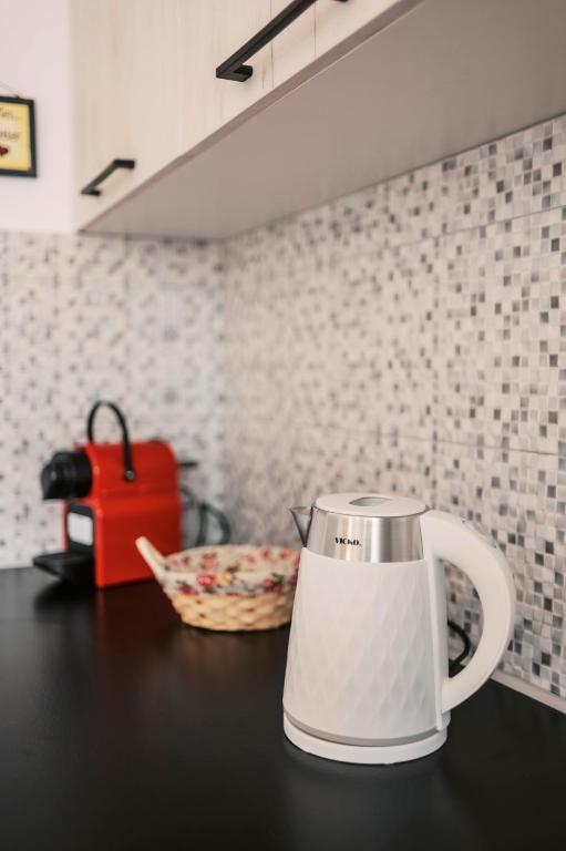 Coffee and tea making facilities at Olympia's Cozy Guesthouse