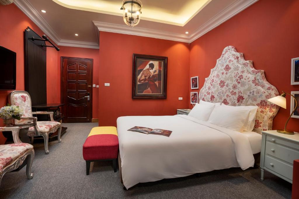 Postel nebo postele na pokoji v ubytování Hanoi Morning Hotel