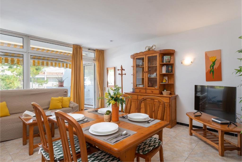 A television and/or entertainment centre at Apartamento Silver