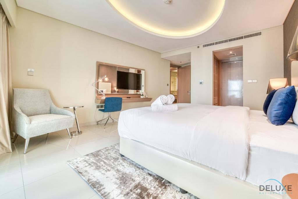 Postel nebo postele na pokoji v ubytování Sophisticated 2BR at DAMAC Towers by Paramount A Business Bay by Deluxe Holiday Homes