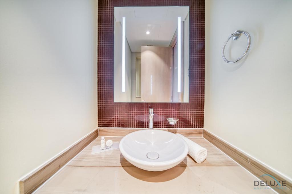 Koupelna v ubytování Sophisticated 2BR at DAMAC Towers by Paramount A Business Bay by Deluxe Holiday Homes