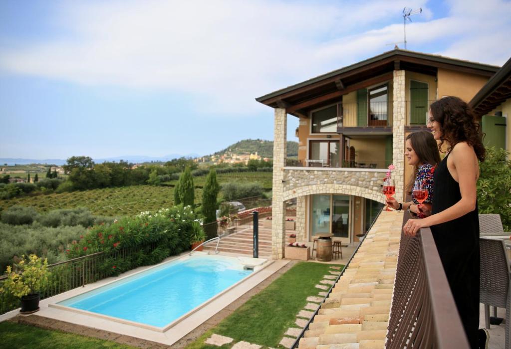 Bazén v ubytování La Cipressina B&B nebo v jeho okolí