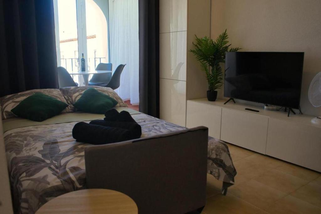 TV a/nebo společenská místnost v ubytování Apartamento Agua Rosa