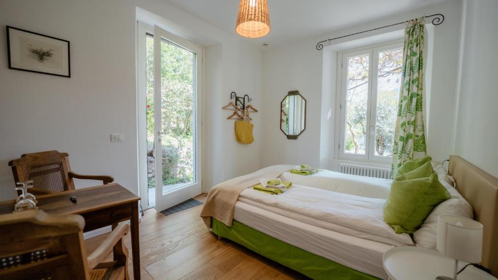 Postel nebo postele na pokoji v ubytování Villa Monte Bianco