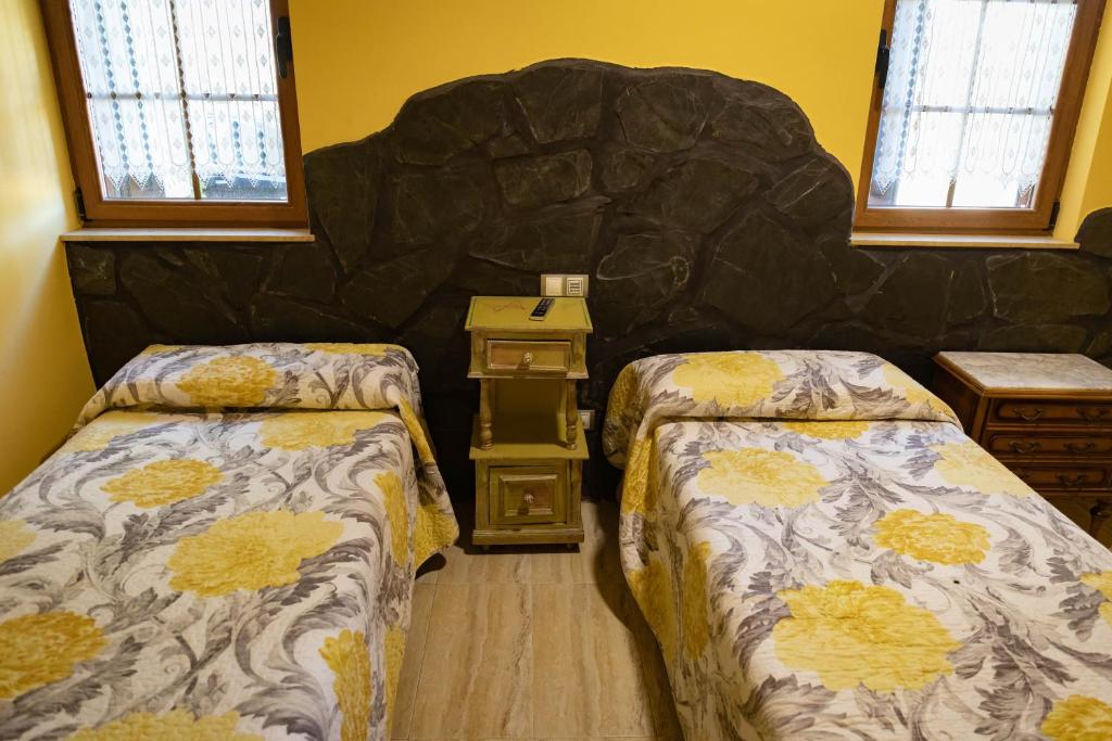 Postel nebo postele na pokoji v ubytování Hotel Un lugar en la Vecilla