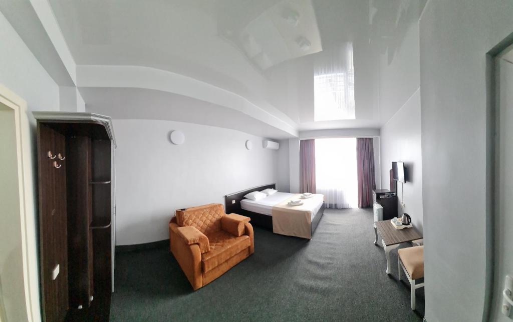 Postel nebo postele na pokoji v ubytování Hotel Genatsvale