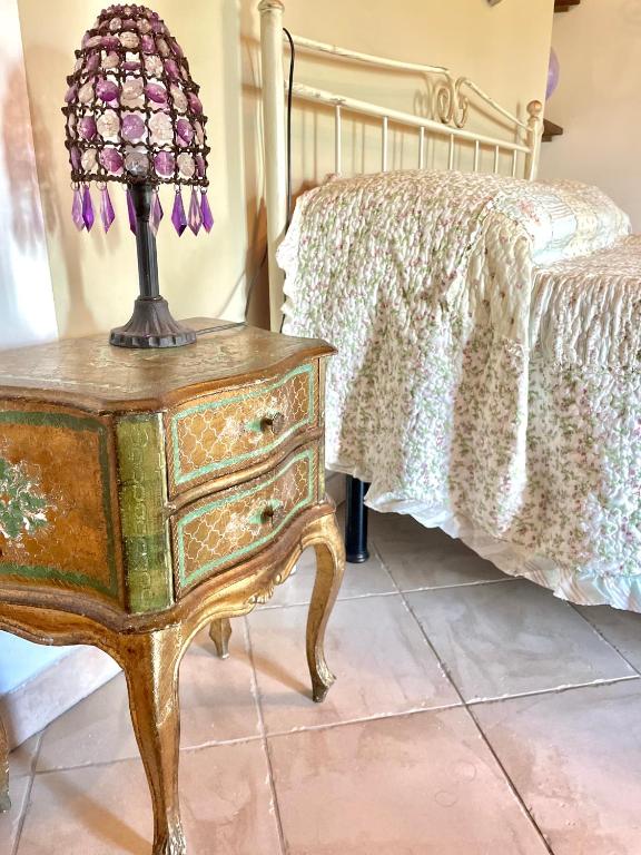 Postel nebo postele na pokoji v ubytování B&B Alloro