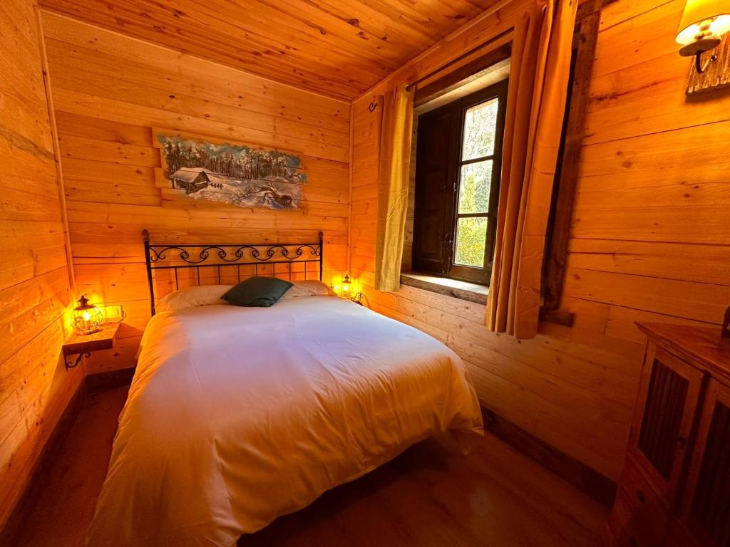 Cama o camas de una habitación en La Posada Cercedilla