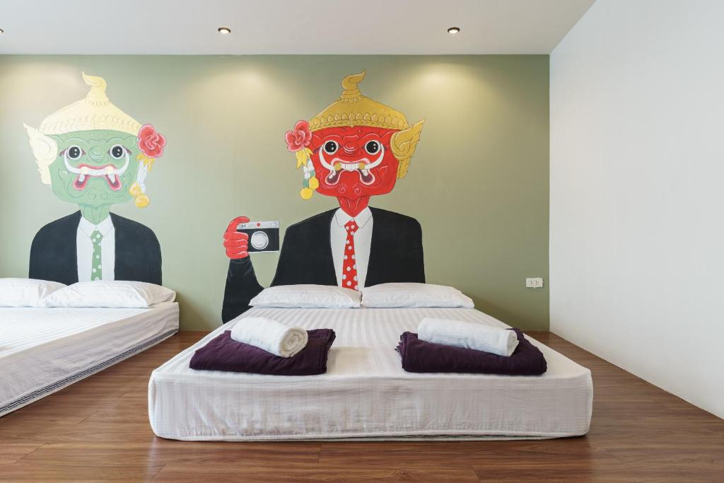 Postel nebo postele na pokoji v ubytování 99 Hostel Khaosan