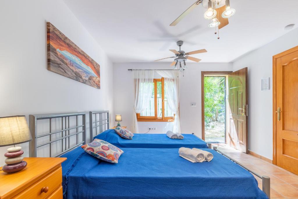 A bed or beds in a room at Holiday Villa Near Denia