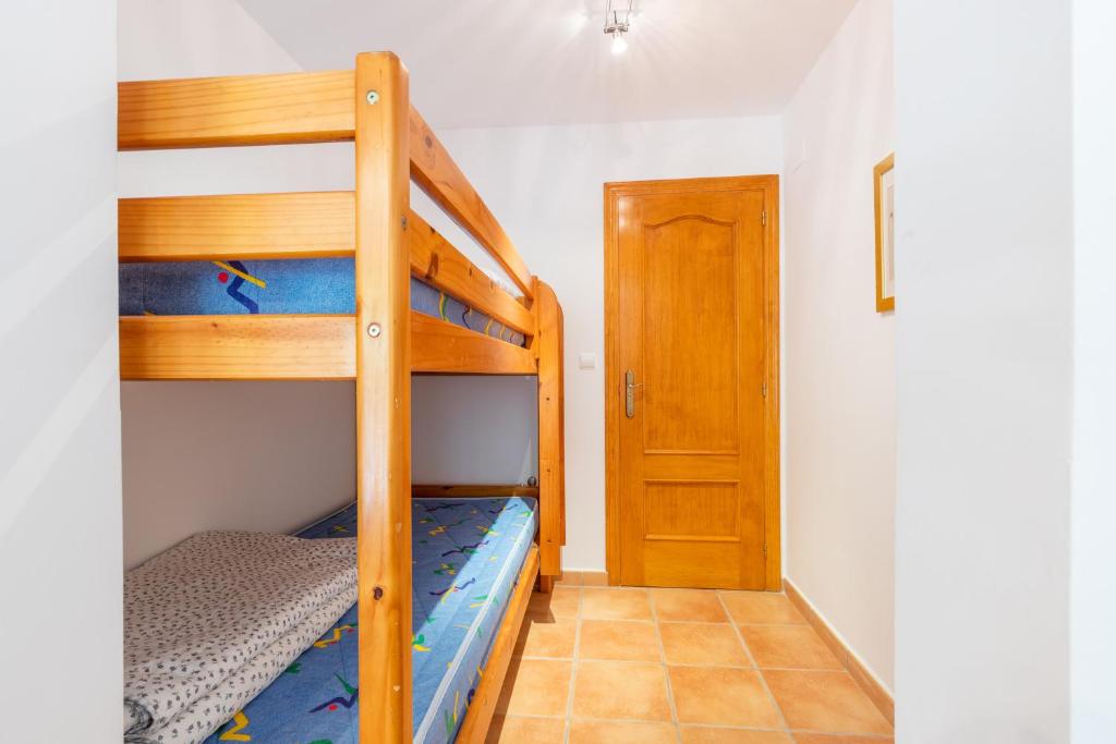 A bed or beds in a room at Holiday Villa Near Denia