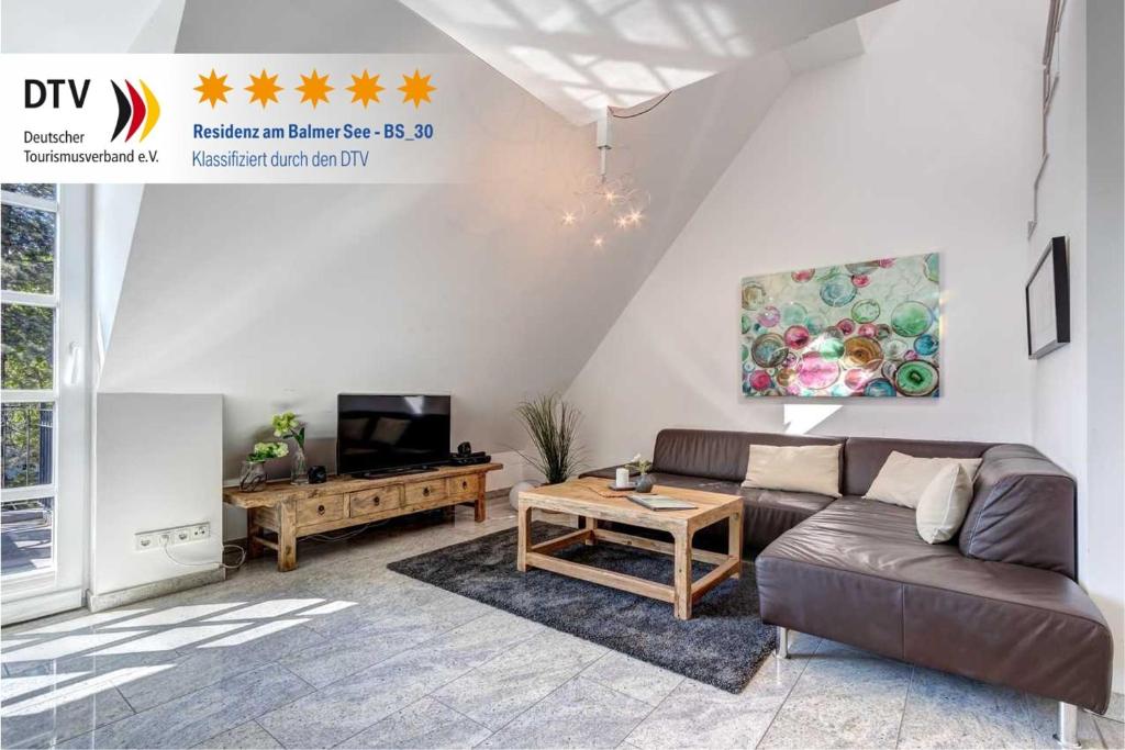 TV a/nebo společenská místnost v ubytování Residenz am Balmer See -BS 30 mit Wellnessbereich