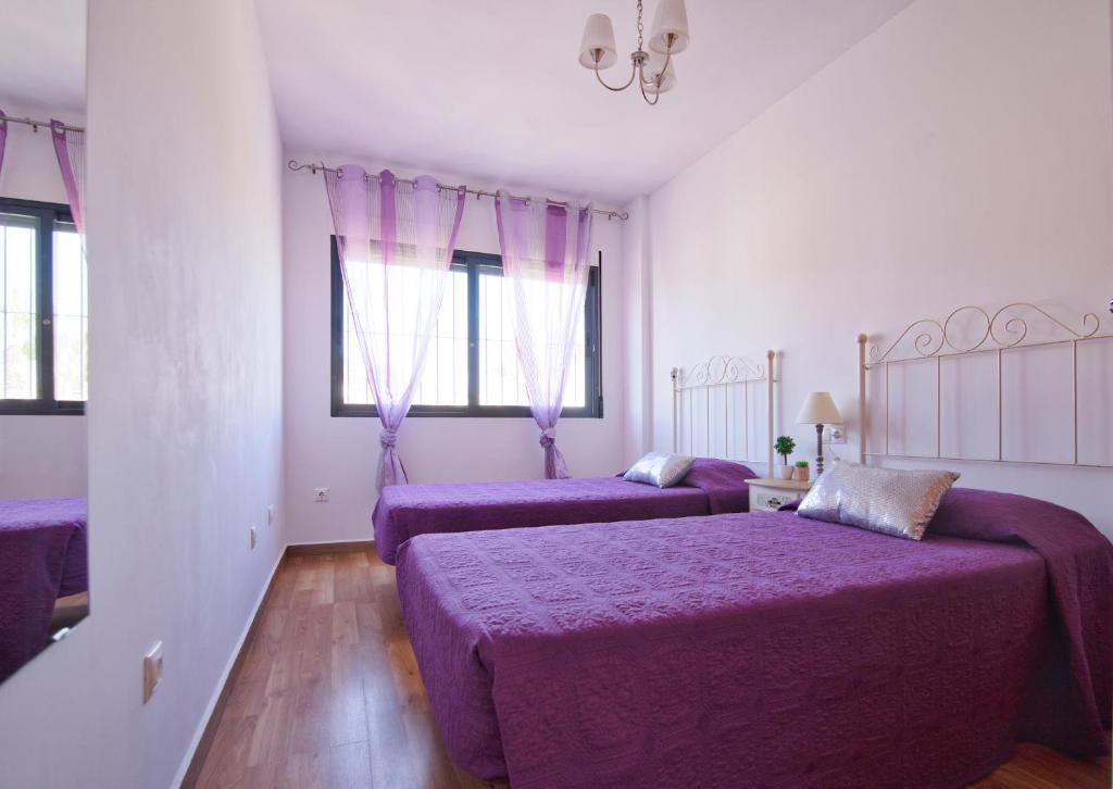 Postel nebo postele na pokoji v ubytování Villa moderna con piscina
