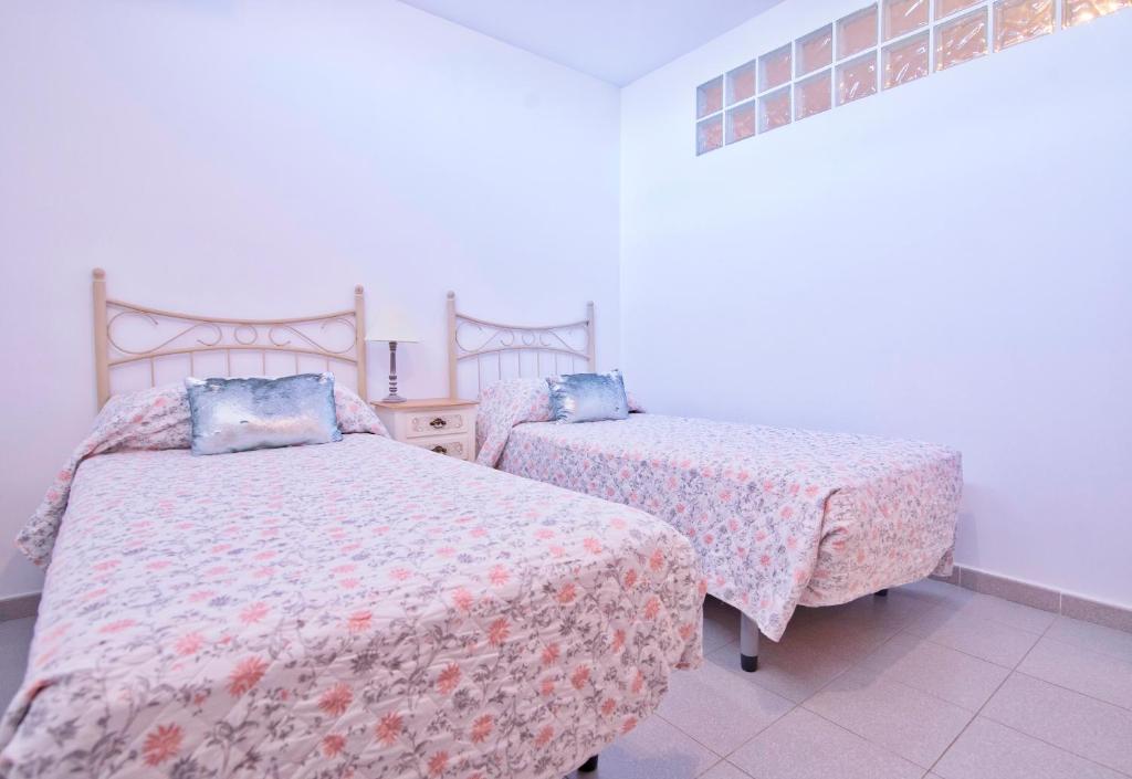 Postel nebo postele na pokoji v ubytování Villa moderna con piscina