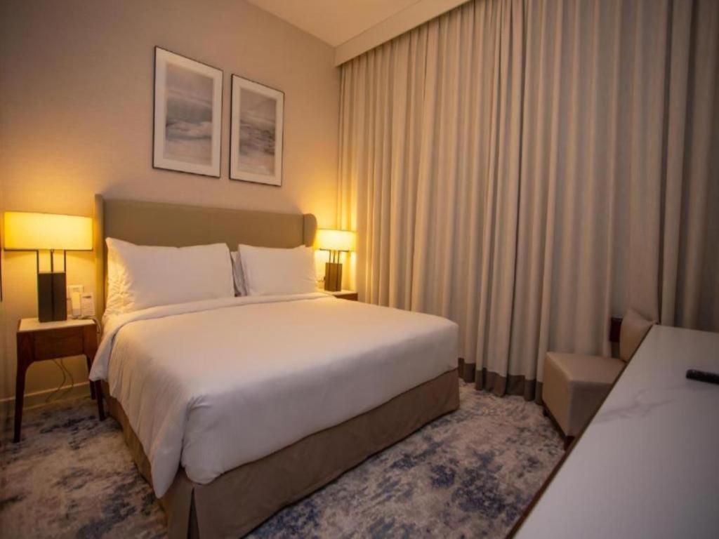 Ocean View Address Beach Resort Fujairah فندق و منتجع شاطئ العنوان الفجيره 객실 침대