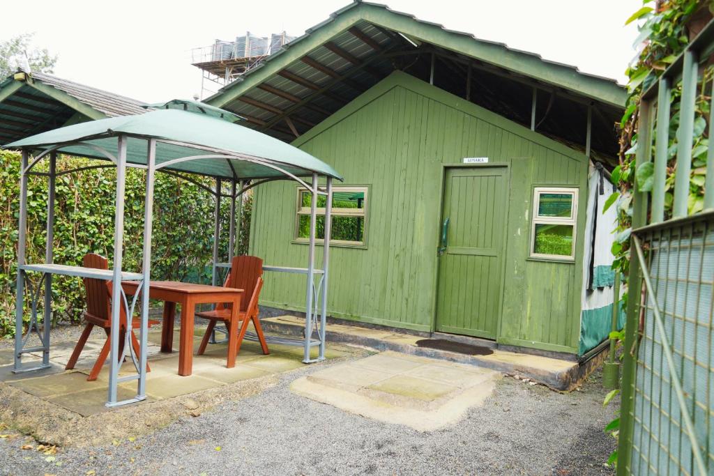 Patio nebo venkovní prostory v ubytování Stedmak Gardens Karen