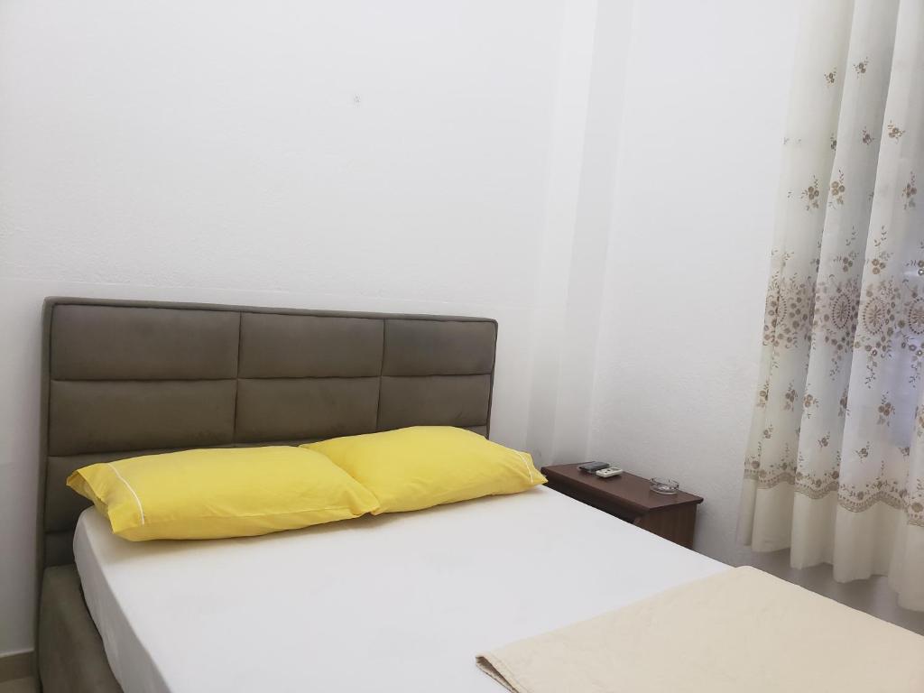 Postel nebo postele na pokoji v ubytování Guest House Kocollari