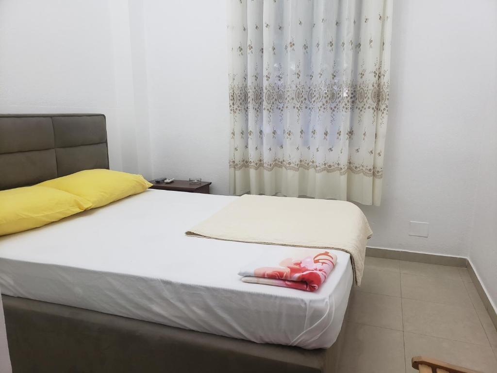 Postel nebo postele na pokoji v ubytování Guest House Kocollari
