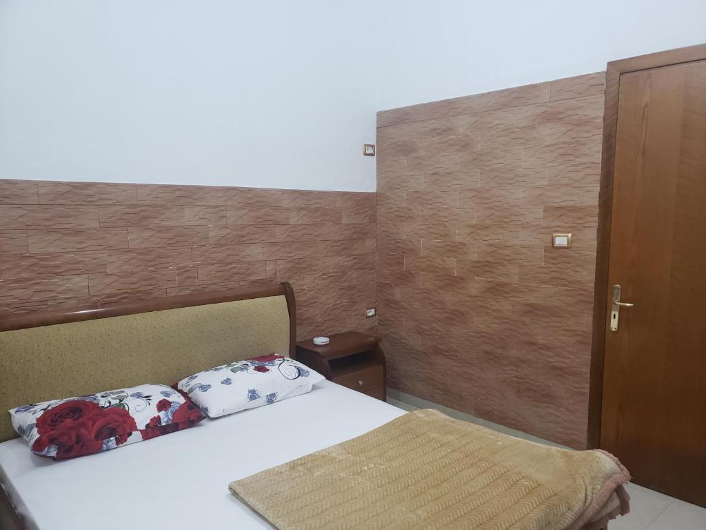 Postel nebo postele na pokoji v ubytování Guest House Kocollari
