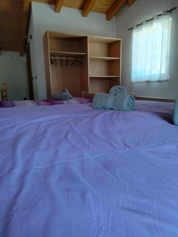 A bed or beds in a room at Agritur Lavanda