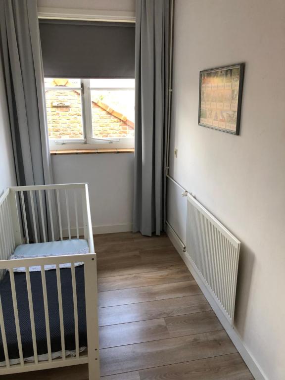 Postel nebo postele na pokoji v ubytování IJsselmeer appartement