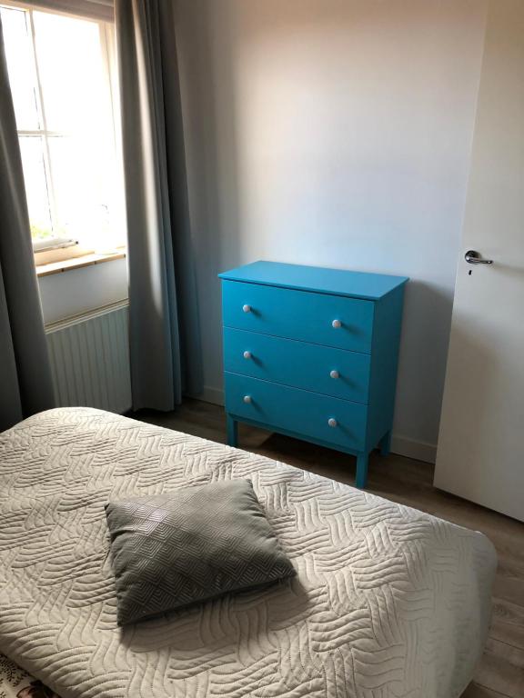 Postel nebo postele na pokoji v ubytování IJsselmeer appartement