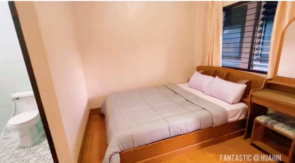 Postel nebo postele na pokoji v ubytování SOLEIL HAUS - Huahin