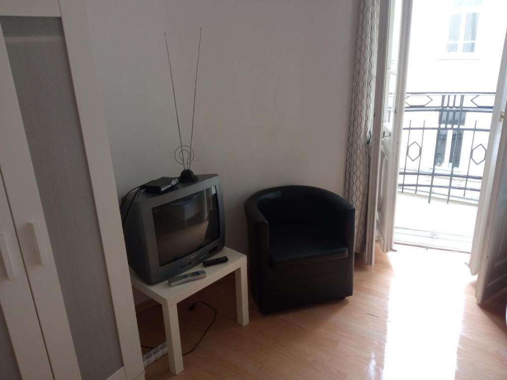 TV a/nebo společenská místnost v ubytování Central Station Hostel