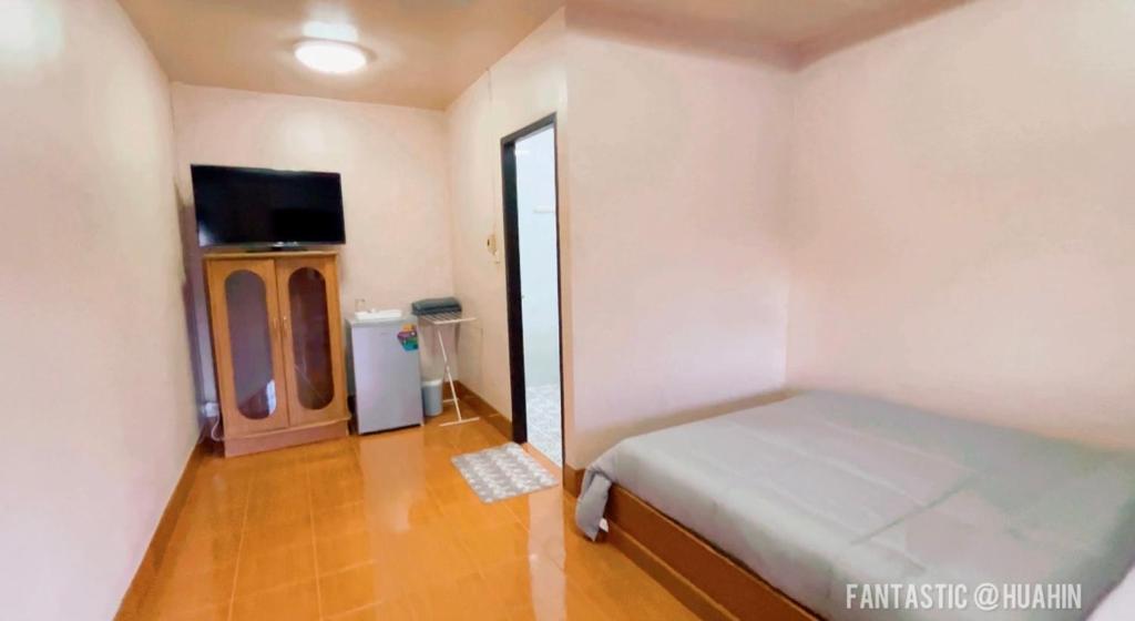 Postel nebo postele na pokoji v ubytování SOLEIL HAUS - Huahin