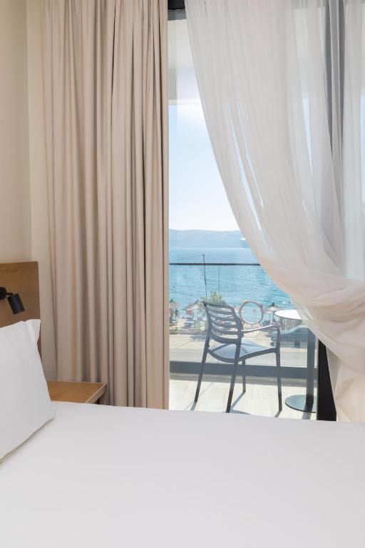 Postel nebo postele na pokoji v ubytování B&B Champagne, Vlore Bay