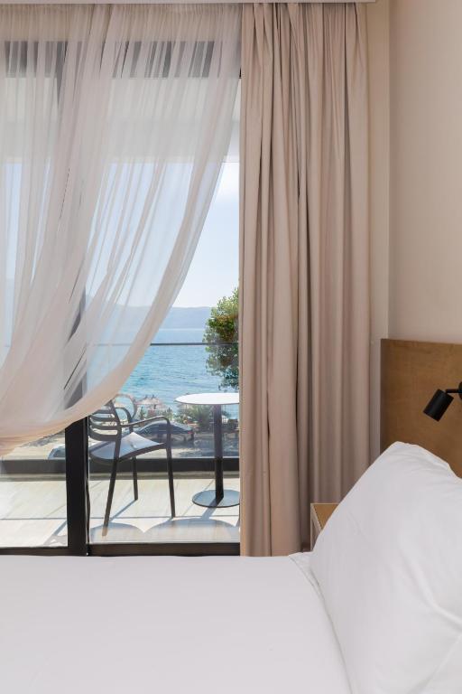 Postel nebo postele na pokoji v ubytování B&B Champagne, Vlore Bay