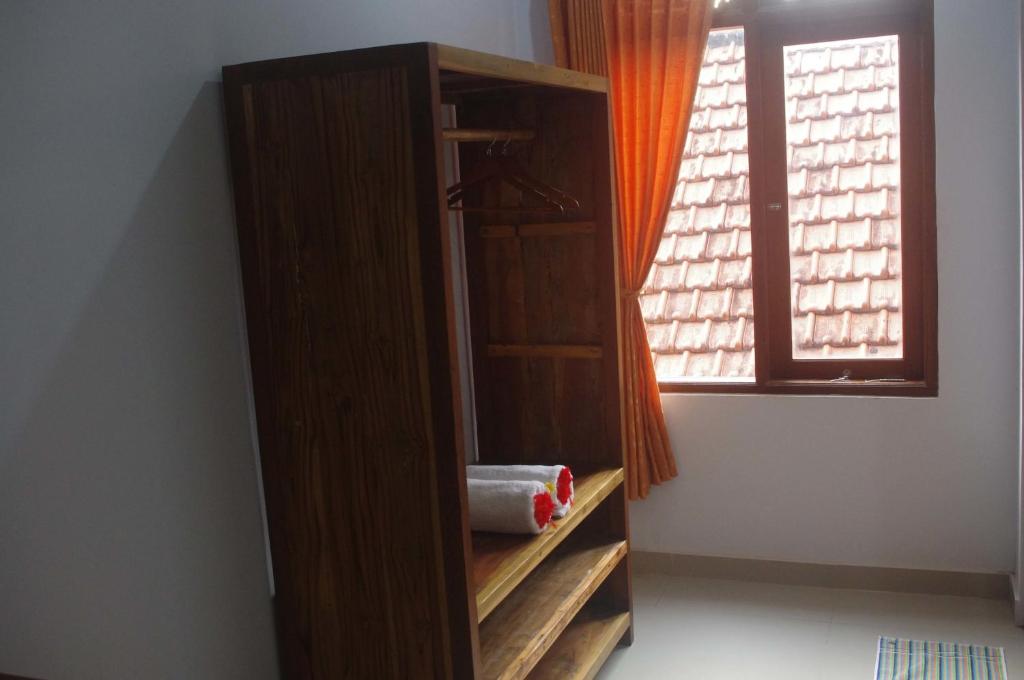 Postel nebo postele na pokoji v ubytování Ramaniya House