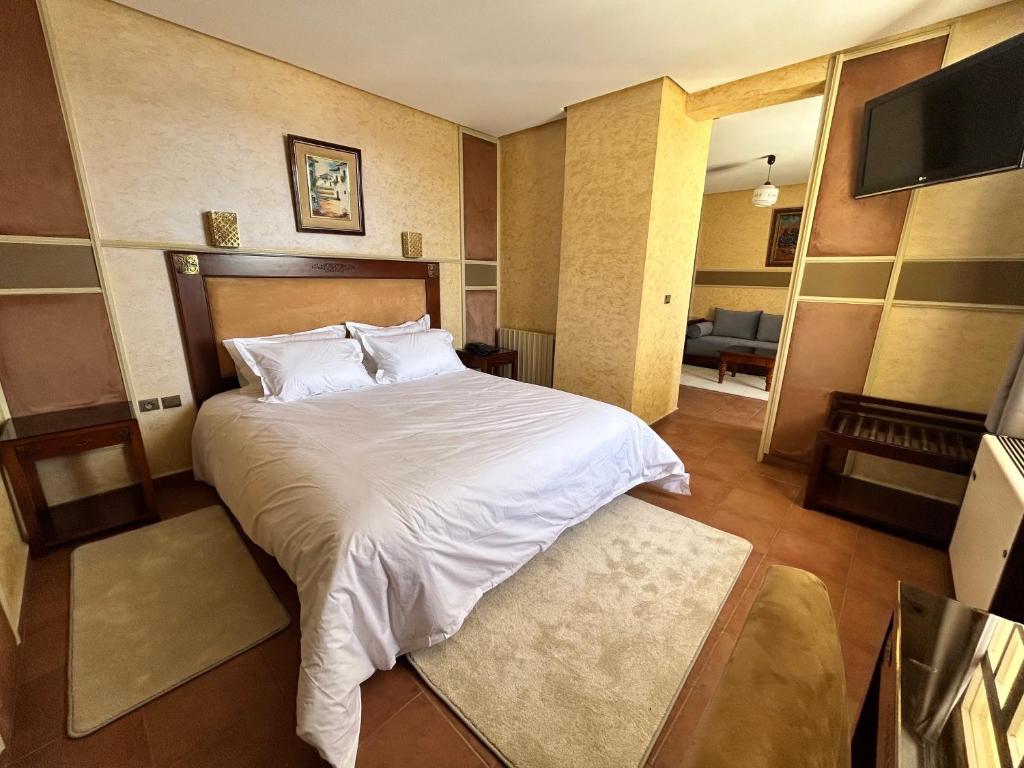 Voodi või voodid majutusasutuse Hotel Bab Mansour toas