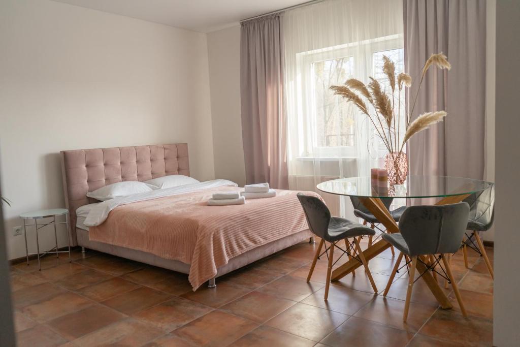 Postel nebo postele na pokoji v ubytování TREND HOUSE Apartments